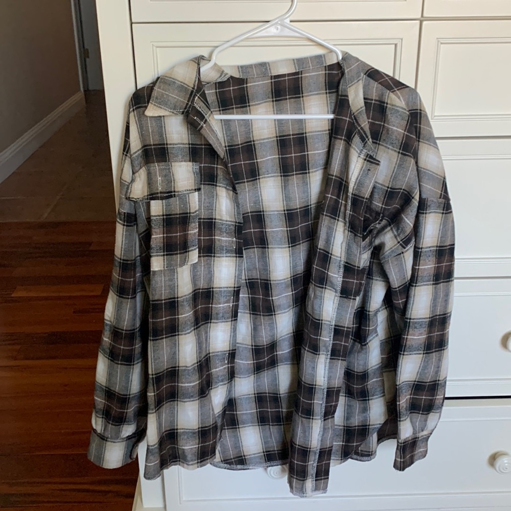 Womens size medium brown, tan, and white flannel.